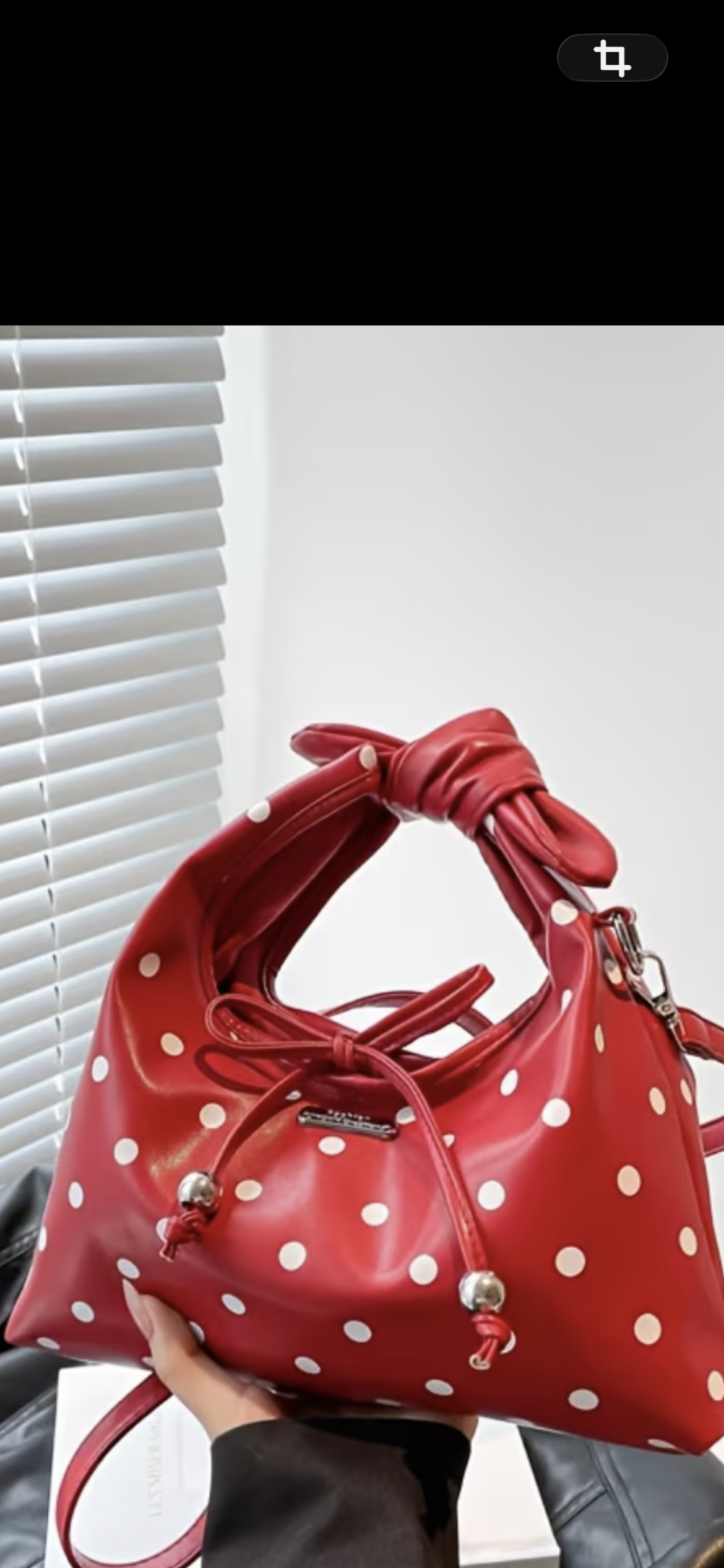 Red and white polka dotted purse
